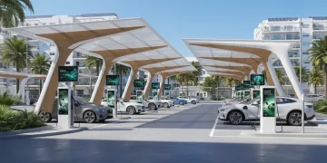 Punto de recarga avanzado para vehículos eléctricos en una ciudad española, reflejando el futuro de la movilidad sostenible.