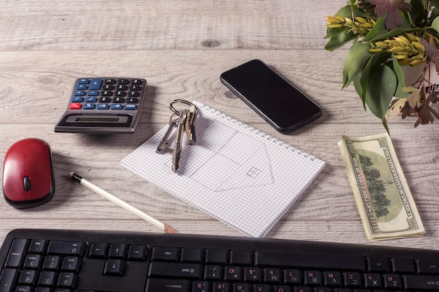 A detailed shot of property tax bill next to house keys, emphasizing the importance of managing homeowner expenses that can be tax deductible.